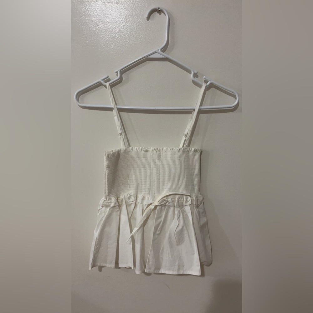 White tank with a bow